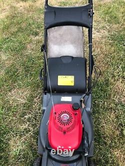 Honda 476 QXE self propelled lawn mower / rear roller model with blade stop